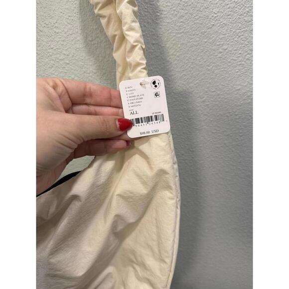 ?$a15-pdp-detail-shot$&fit=  Free People Vinyasa Convertible Sling bag NWT